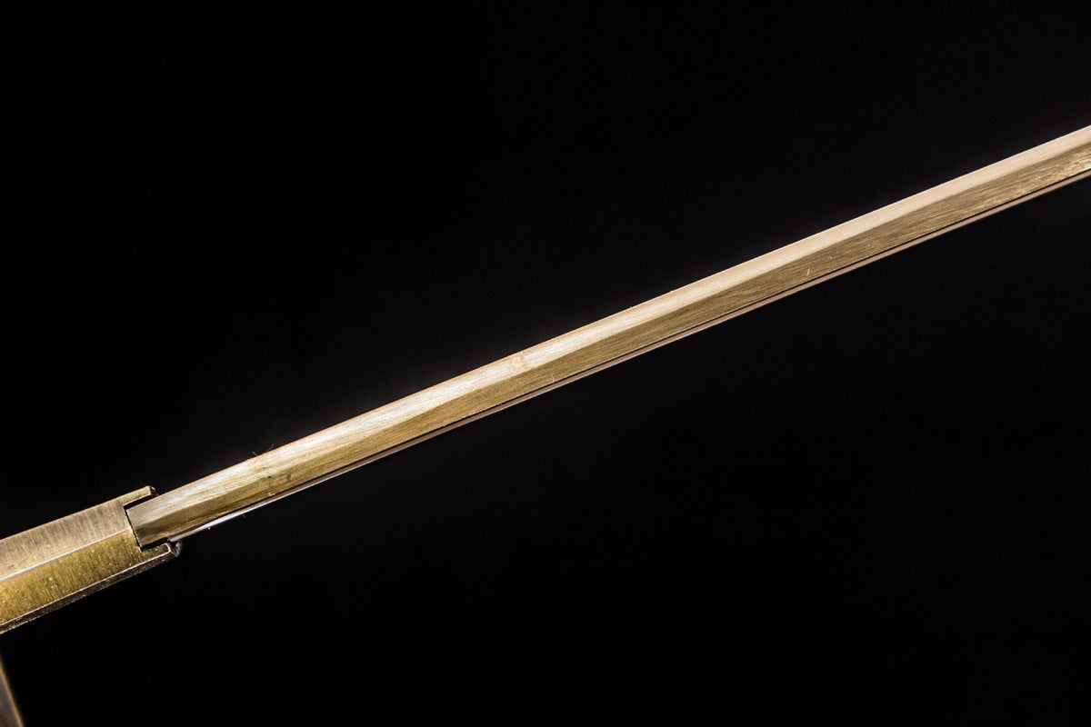 Detail view of the Sakura in Gold Katana, showing the gold-finished blade and orange handle