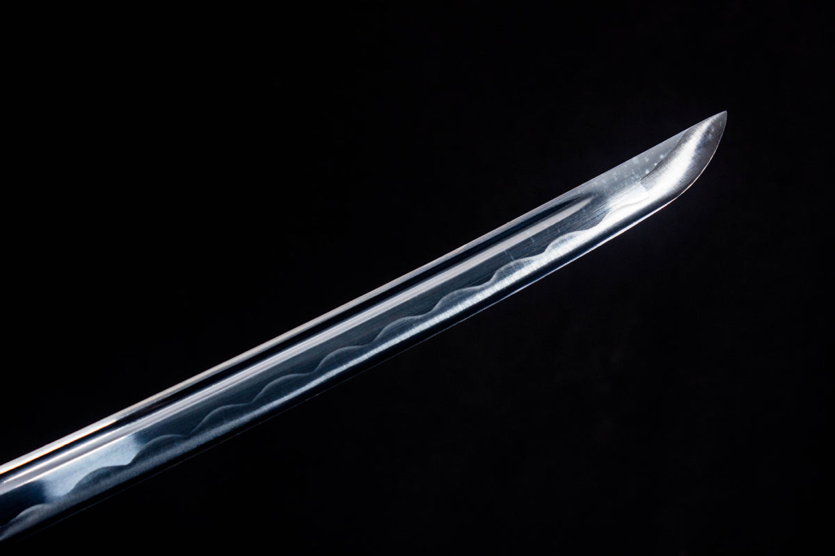 Close-up of the Cobalt Shadow Katana’s polished blade with a flowing visible line
