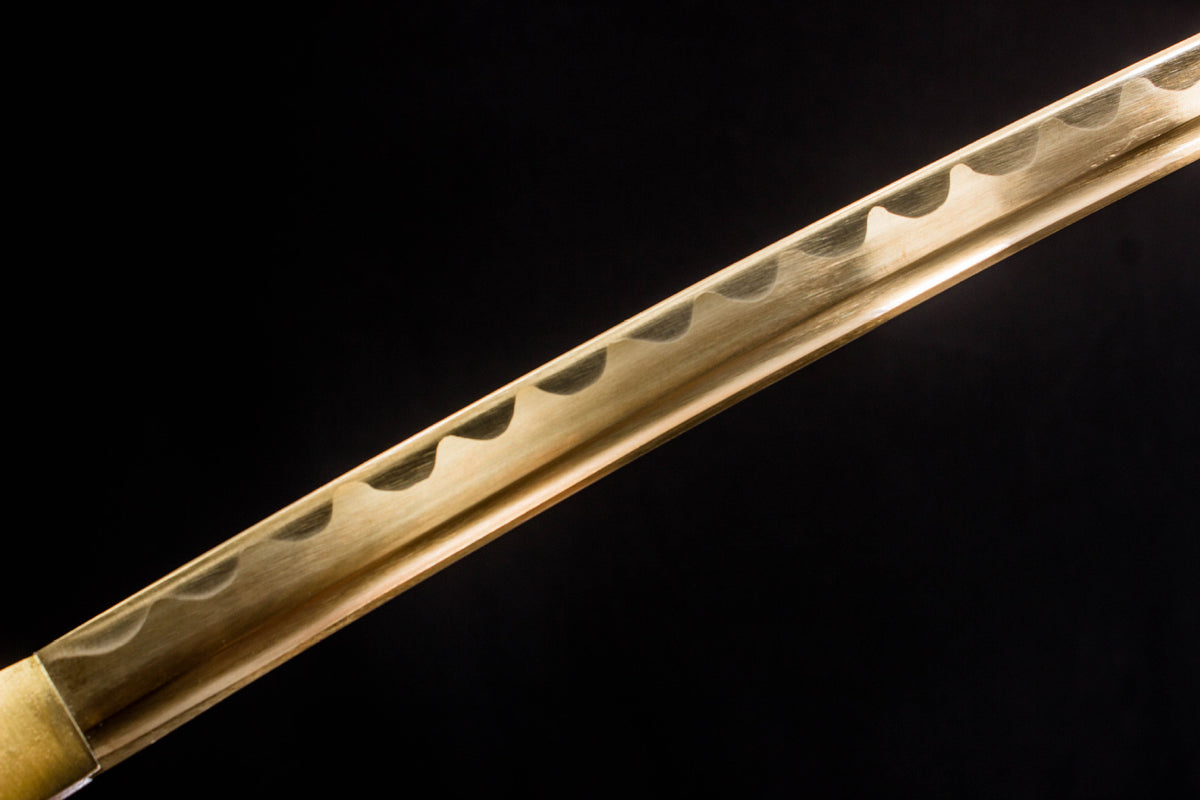 The Sakura in Gold Katana, showing the black-and-orange saya with sakura motif