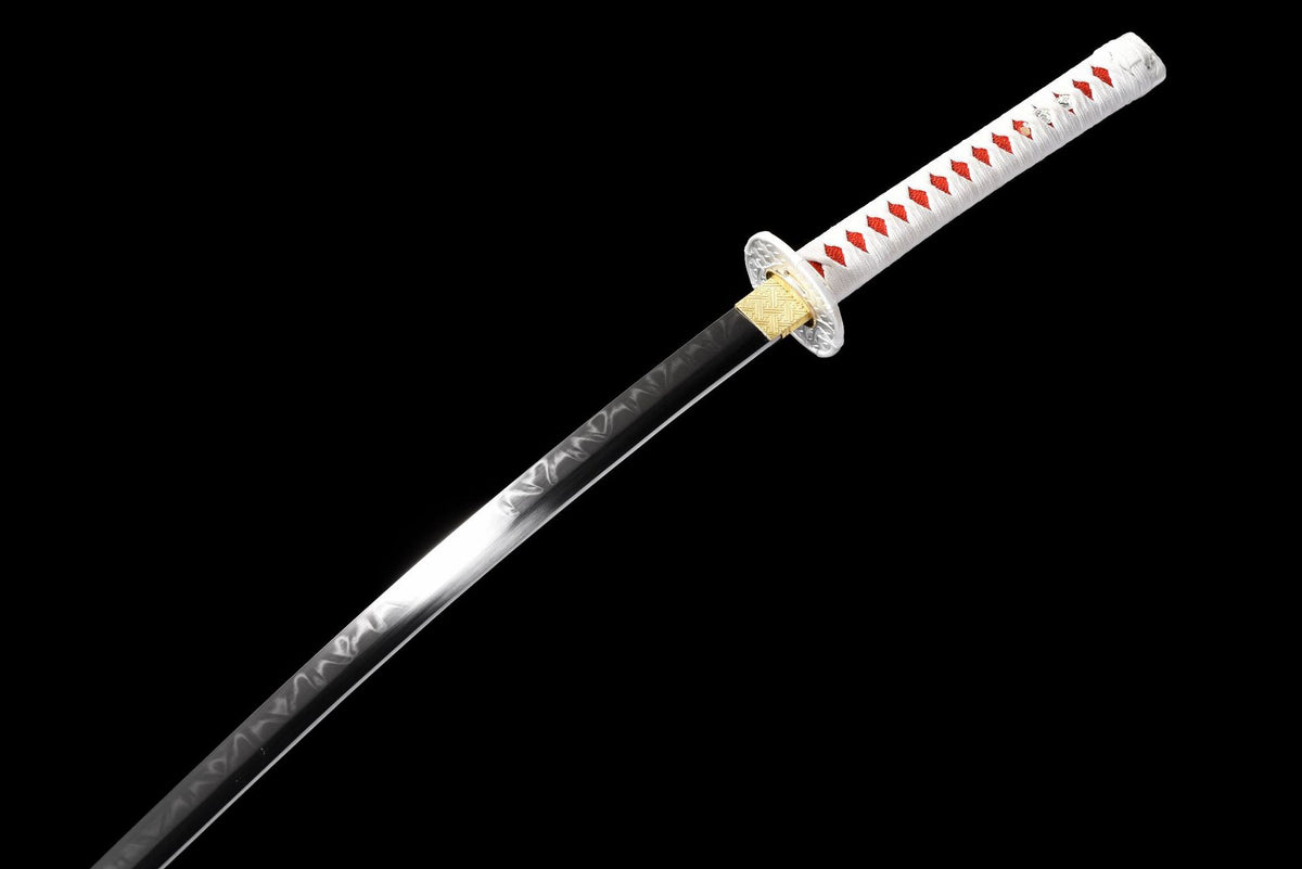 Three-quarter view of the black blade and white wrapped handle