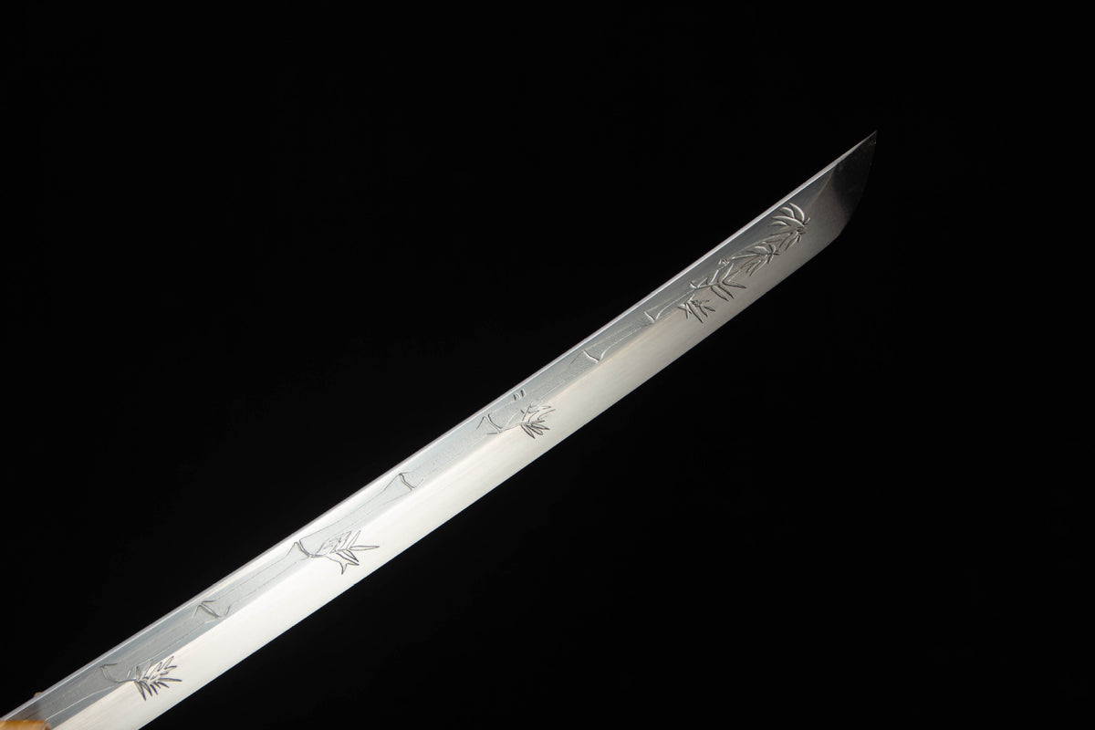 Detail view of the Turquoise Pearl Katana, showing the turquoise handle wrap and green marbled saya