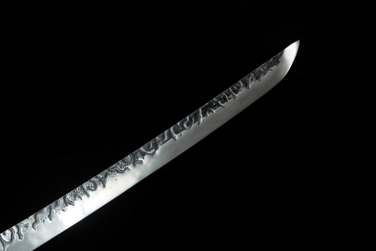 The Autumn Mist Katana with the seasonal pattern on the lacquer