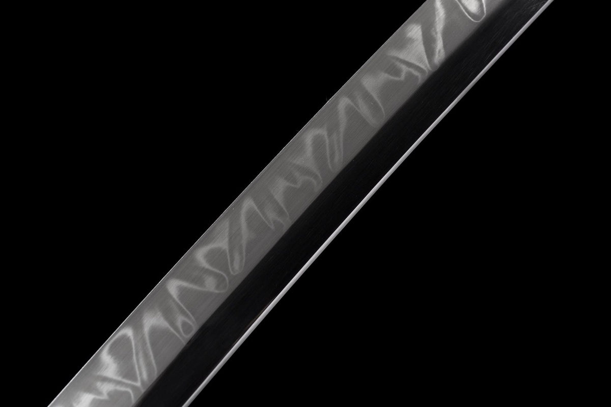 Close view of a visible wave-like line on the black blade
