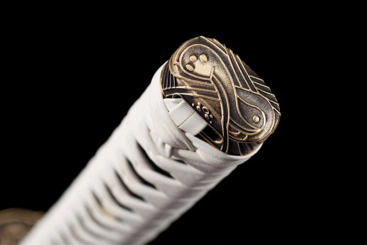 Close-up detail of the Devil May Cry Extended Yamato Katana, including the white handle and copper fittings