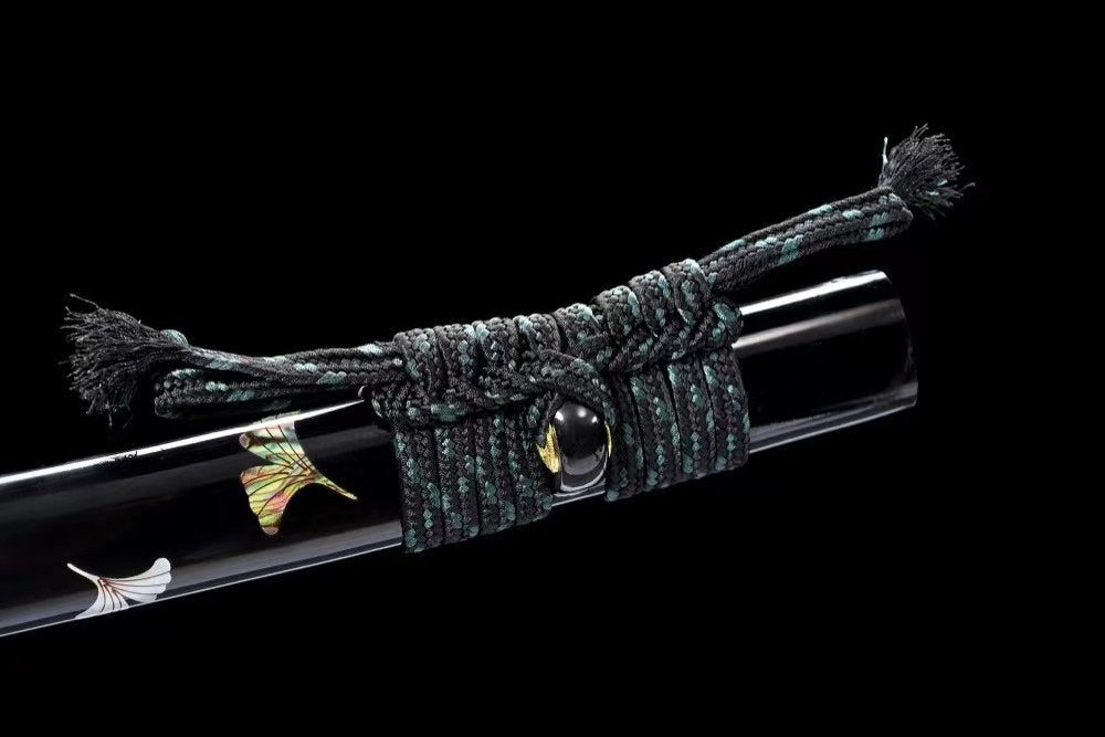 Close-up detail of the Garden at Dusk Katana, including the flowing blade line and guard