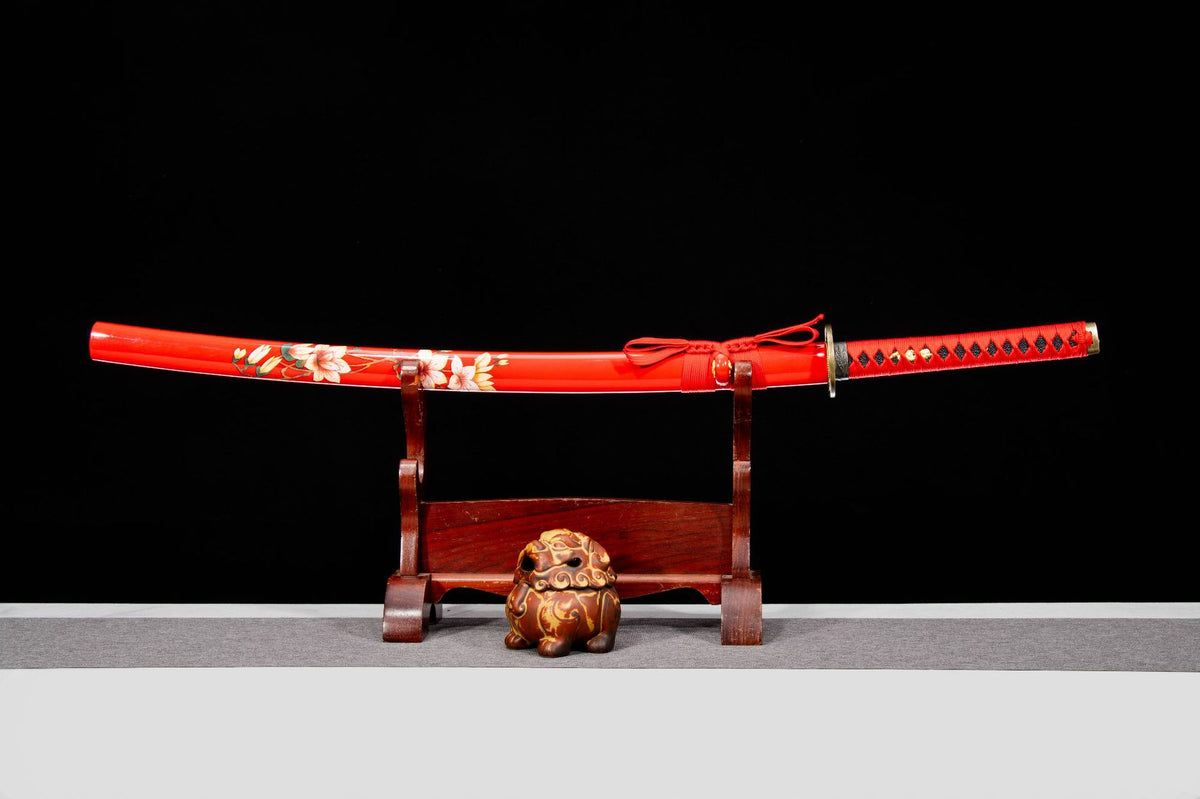 Crimson Blossom Katana displayed sheathed with a red floral saya and red handle wrap