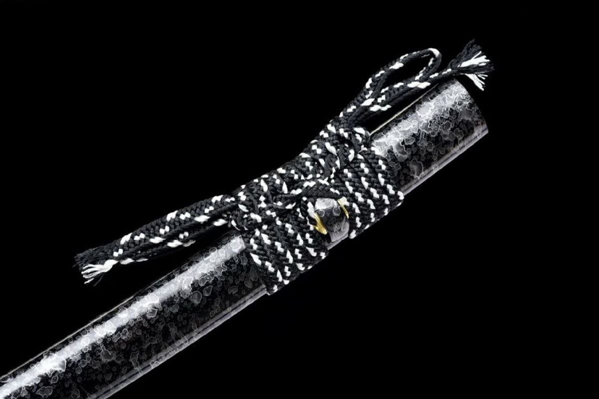 Black lacquered wood scabbard with fractured-ice pattern and black-white cord