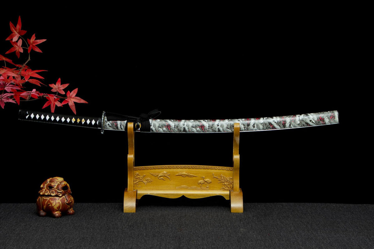 Autumn Mist Katana displayed sheathed with a black handle and white-gray patterned saya