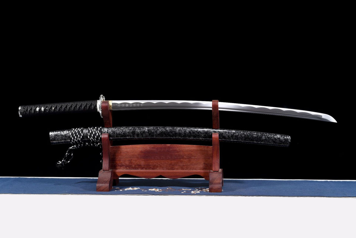 Thaw katana with dark patterned blade and fractured-ice lacquered wood scabbard