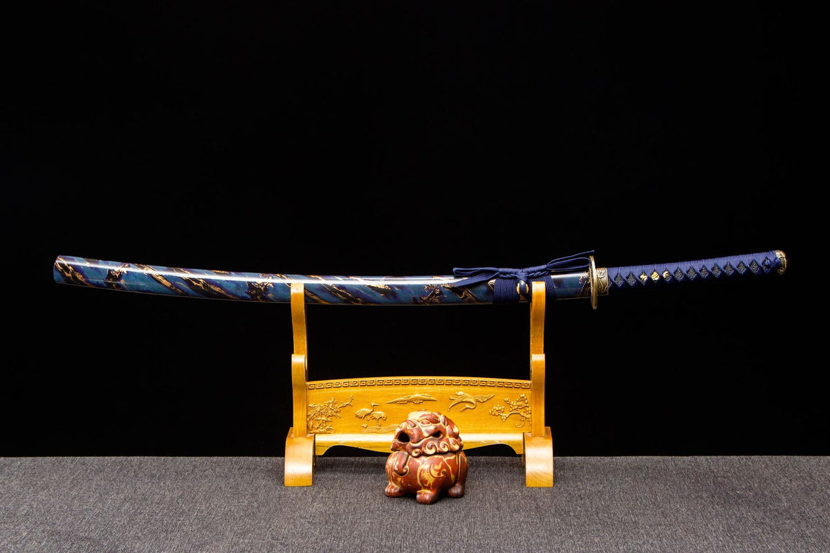 Midnight Studwork Katana displayed sheathed with a blue-and-gold patterned saya and dark blue handle wrap