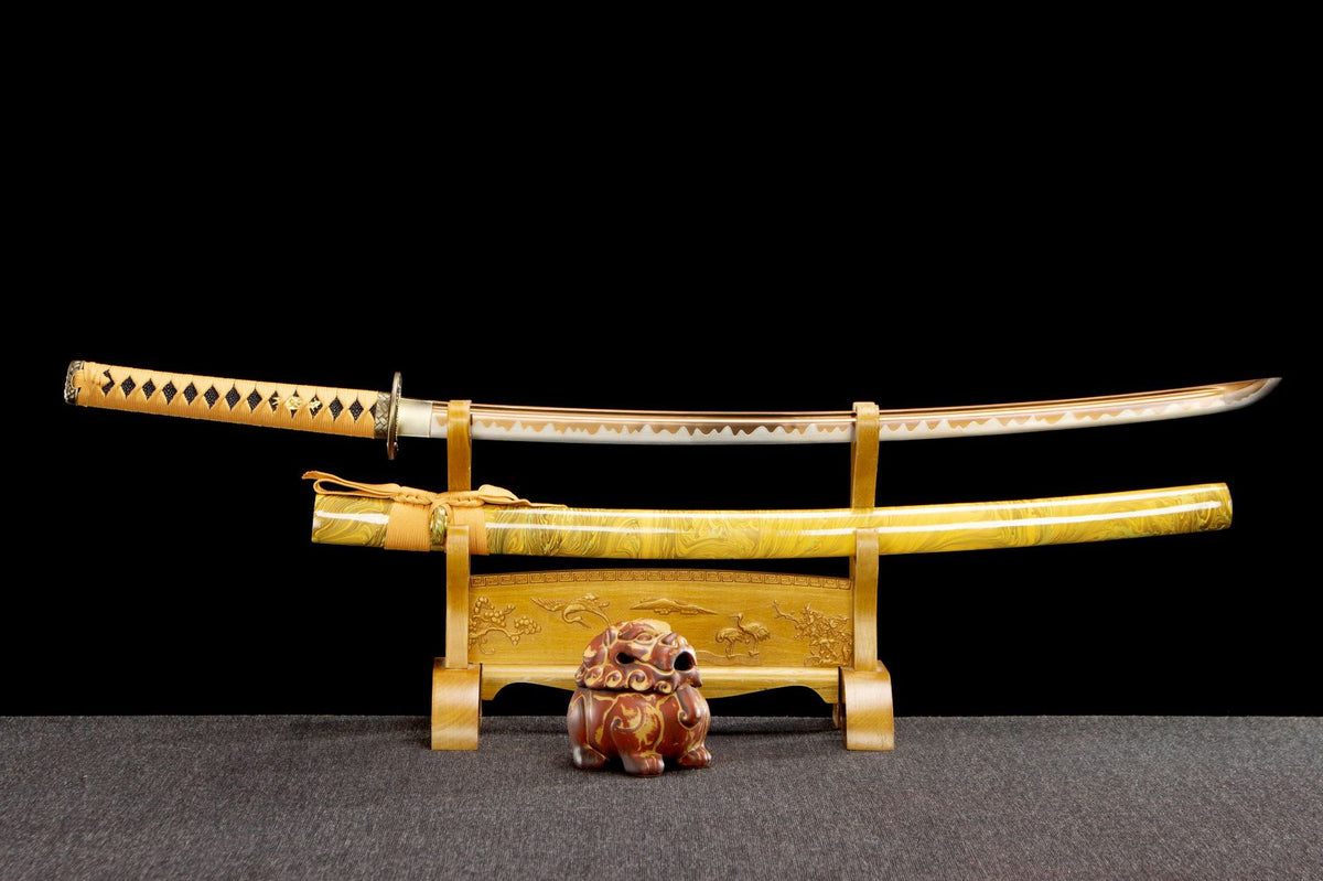 Golden Pearl Katana with a gold handle, pale engraved blade, and yellow marbled saya