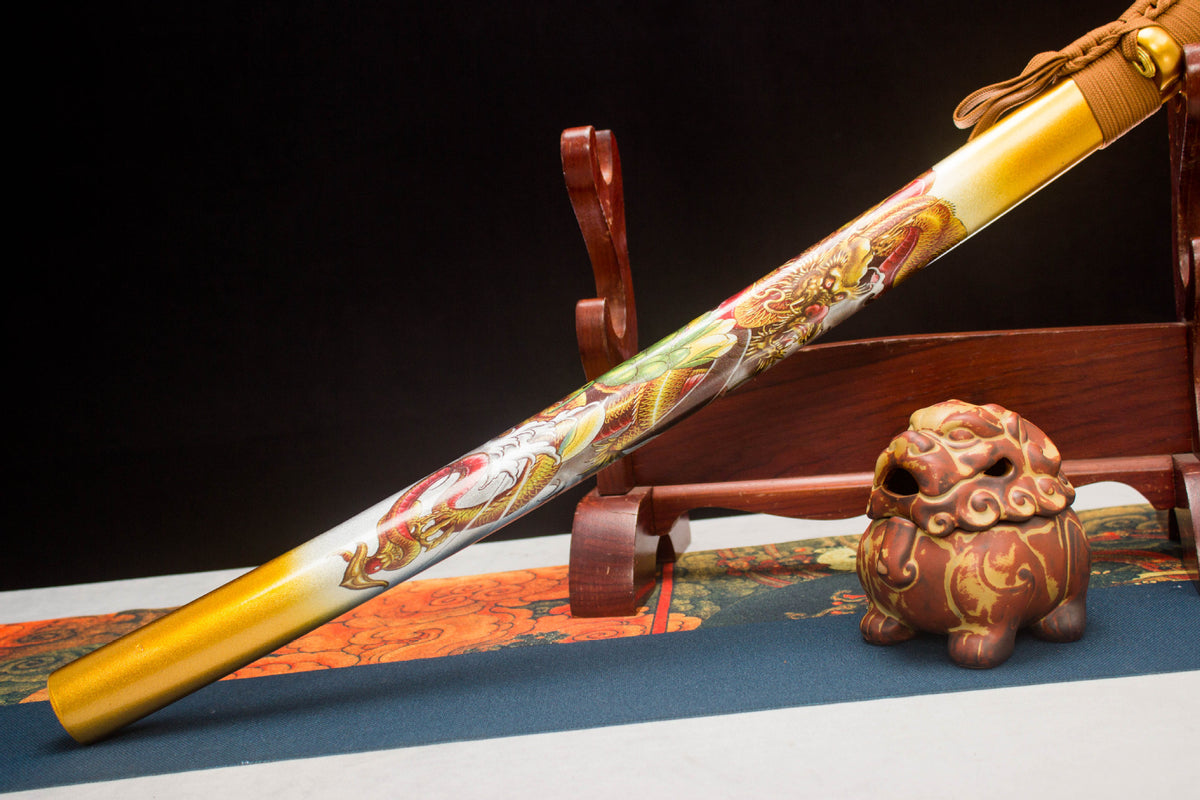 Gold blade close-up with decorative wave pattern