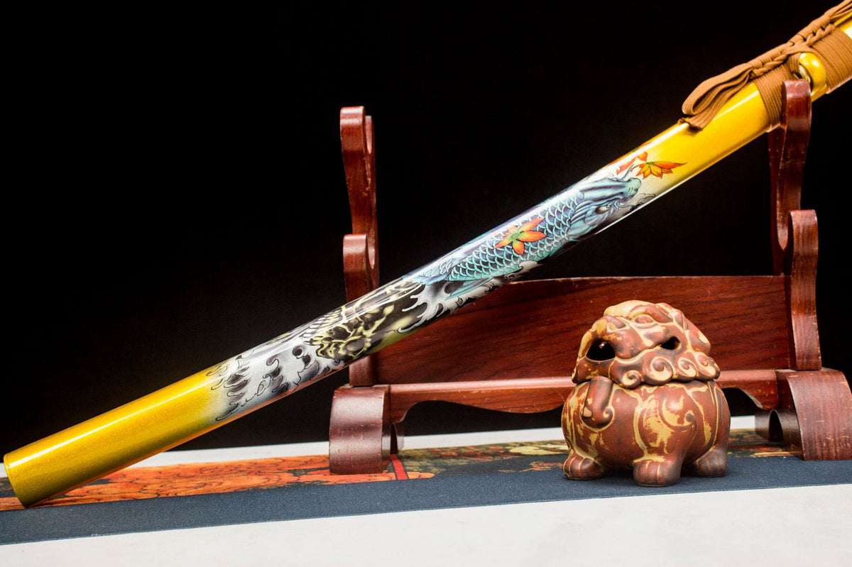 Aureate Koi Katana showing the yellow koi-illustrated saya and orange handle wrap