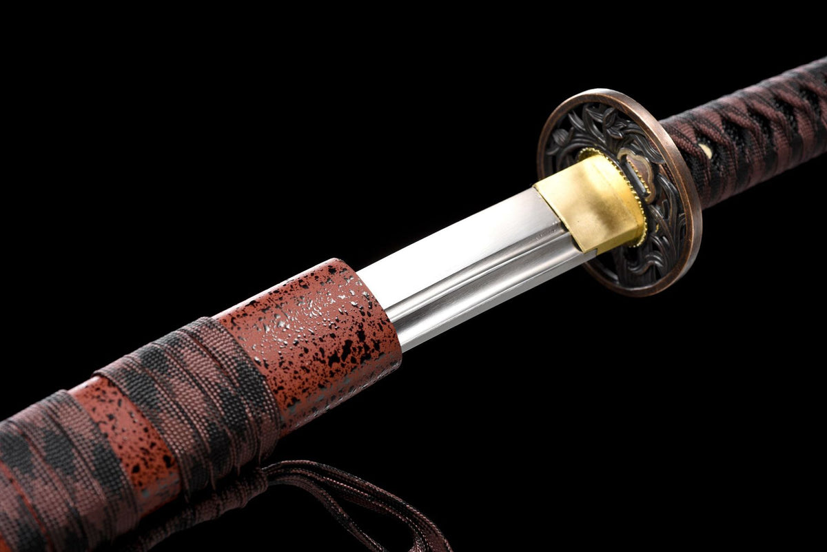 Close-up of the Night Current Katana’s polished blade, bo-hi, guard, and brown handle wrap