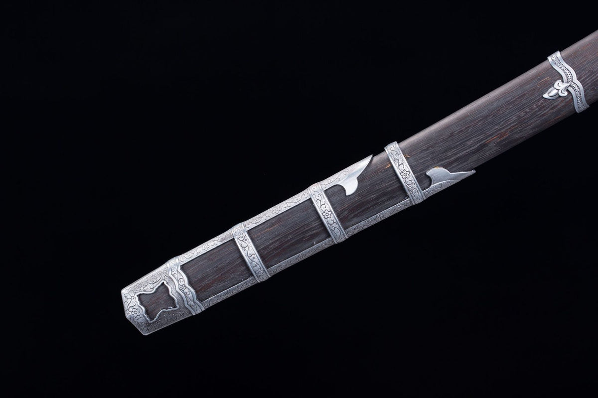 Detail view of the Sekiro Kusabimaru, showing the dark handle wrap and polished fittings