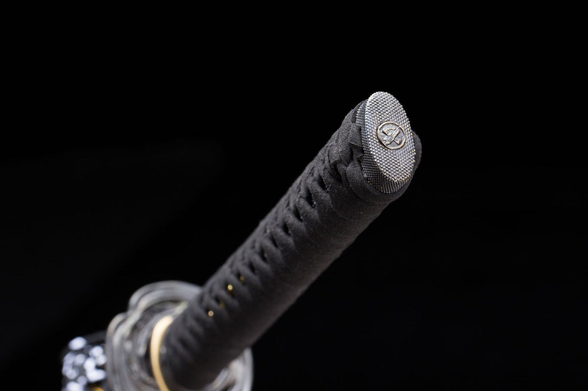 Black wrapped tsuka and end-cap detail on the Sable Katana