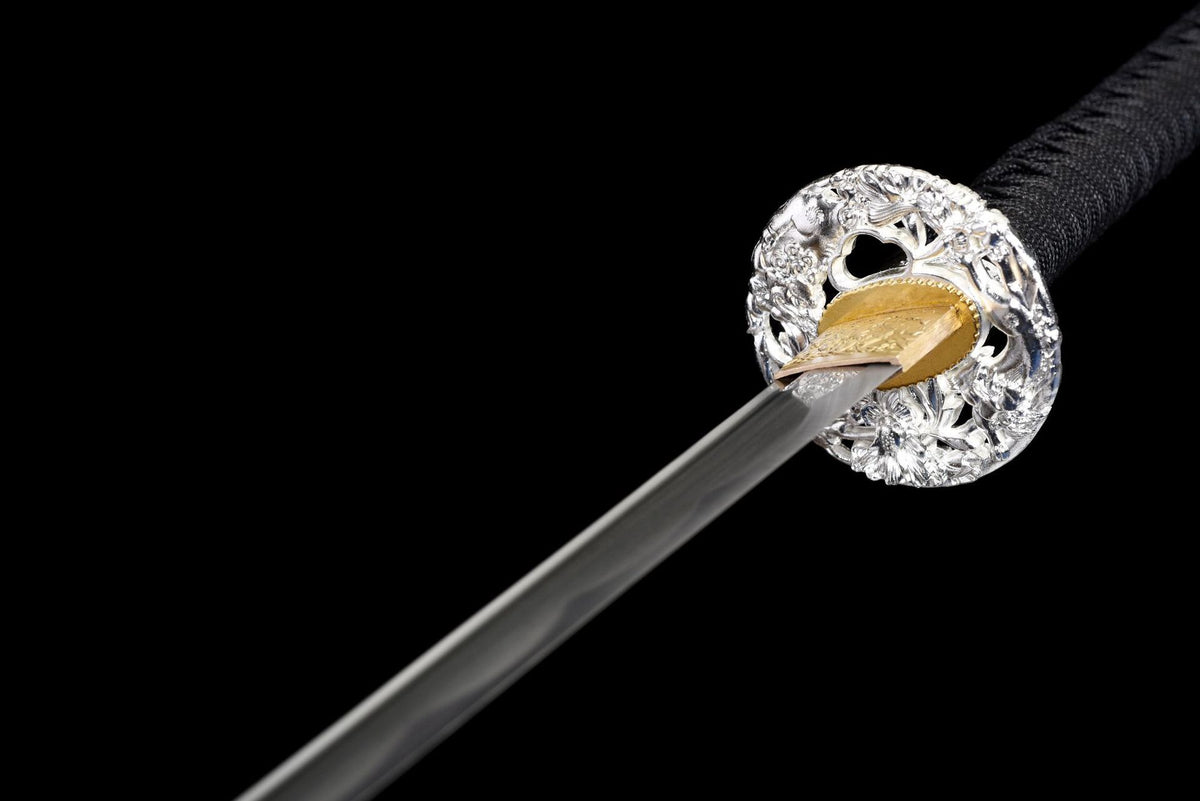 Silver-toned flower-pattern alloy guard with black cord-wrapped handle