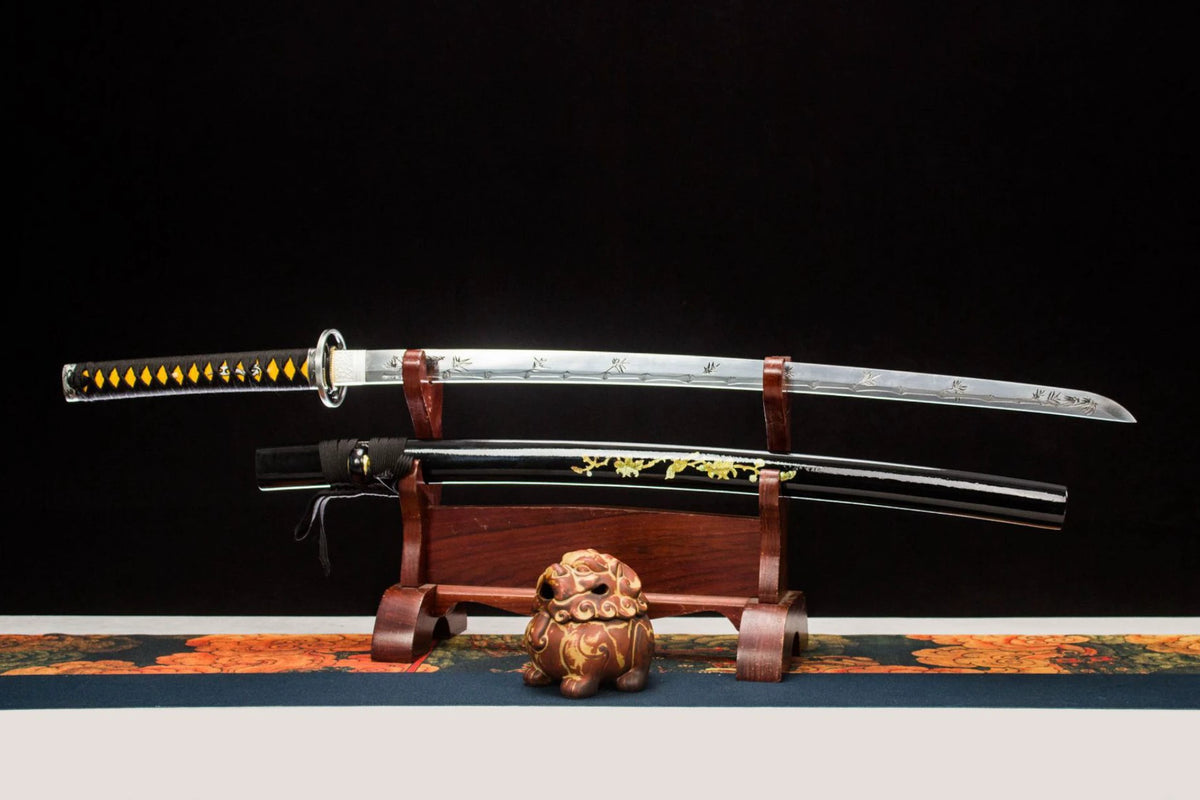 Gilded Dragon Katana with a polished silver blade, black saya, and gold dragon motif