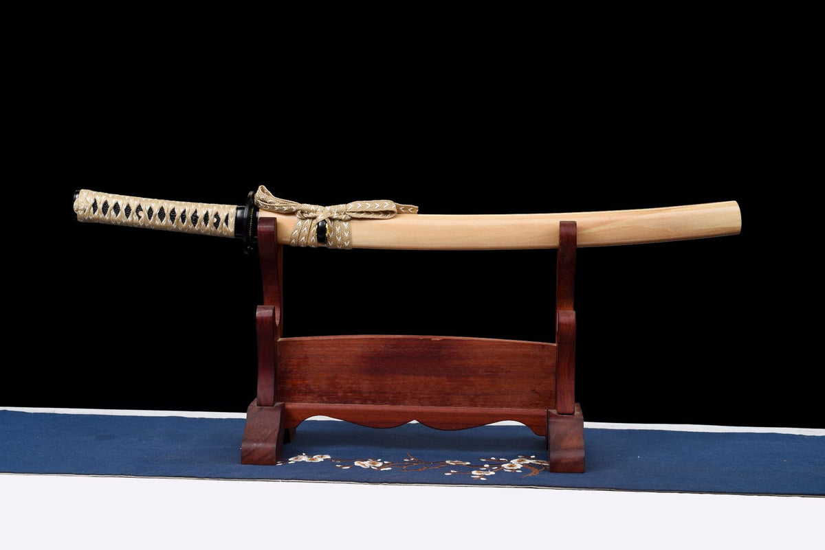 Woodheart Wakizashi, sheathed view of the pale wood saya and ivory-wrapped handle