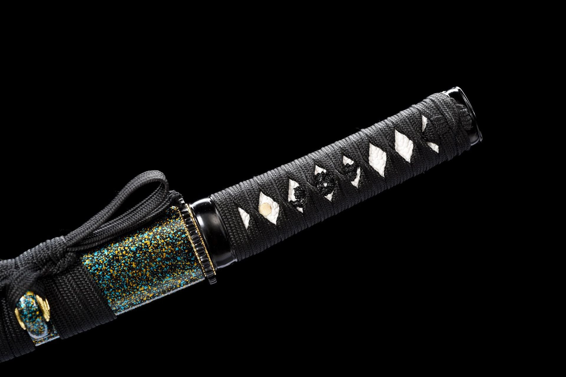 Black wrapped wakizashi handle with white diamond-pattern underlay