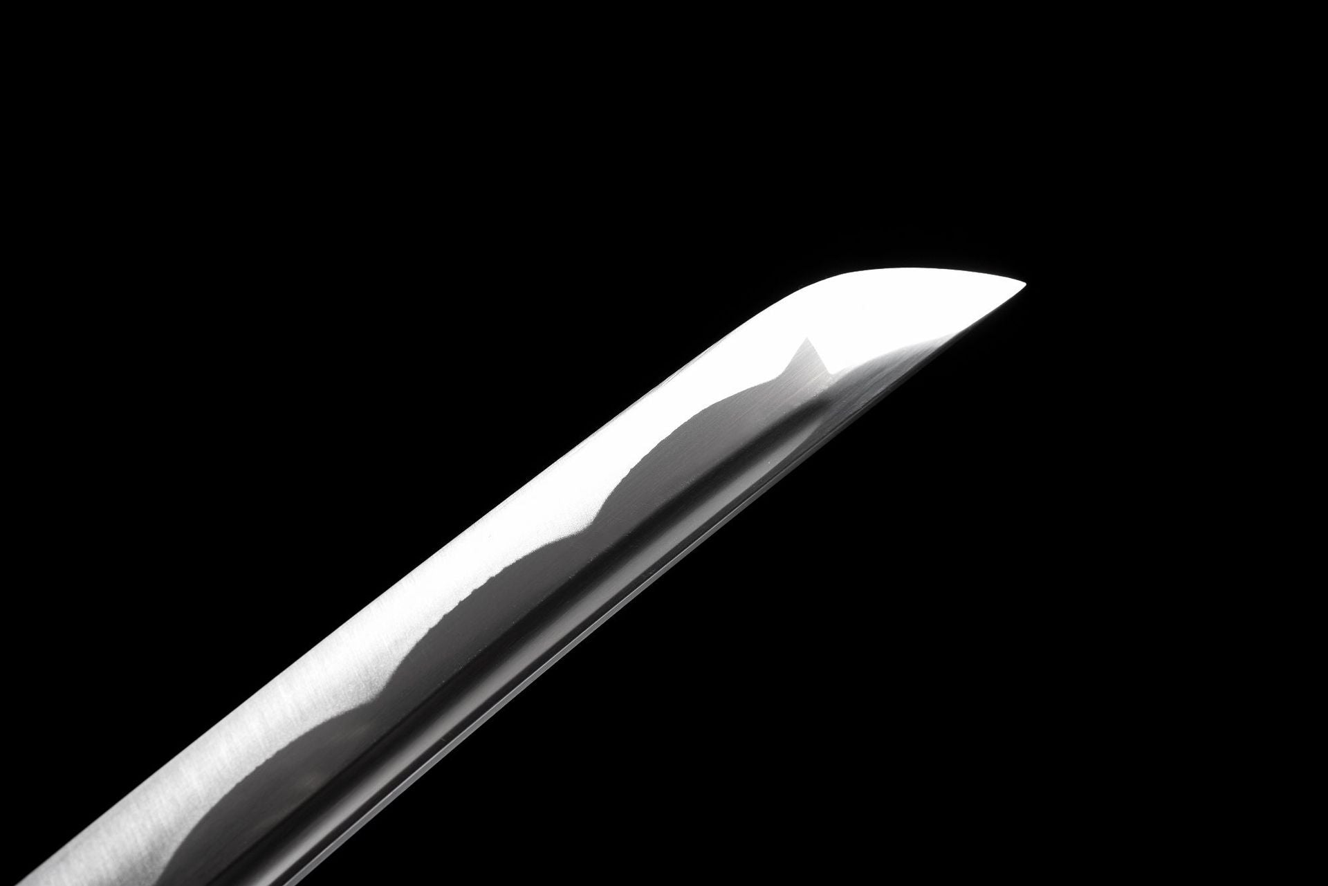 Kissaki tip of the grooved 1045 carbon steel wakizashi blade