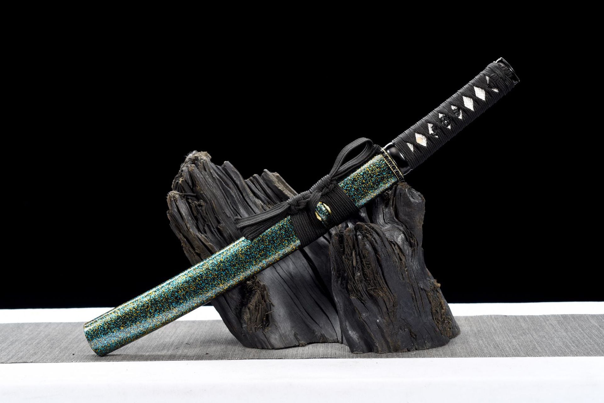 Aogane Spark Wakizashi sheathed in its blue-gold lacquered wooden saya