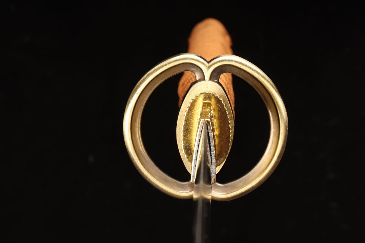 Double-lobed openwork tsuba on the Aoi Crest Katana