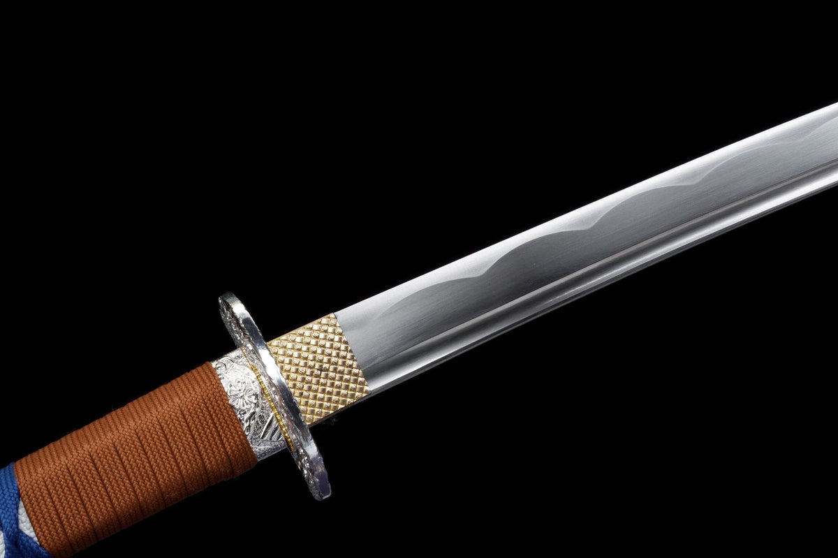 Medium-carbon-steel katana blade with bo-hi, textured habaki, and ornate tsuba
