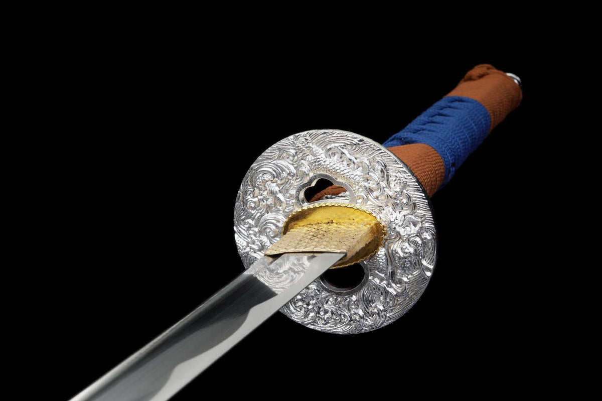 Ornate silver-tone round tsuba and blue-brown tsuka on the Blue Gold Lacquer Katana
