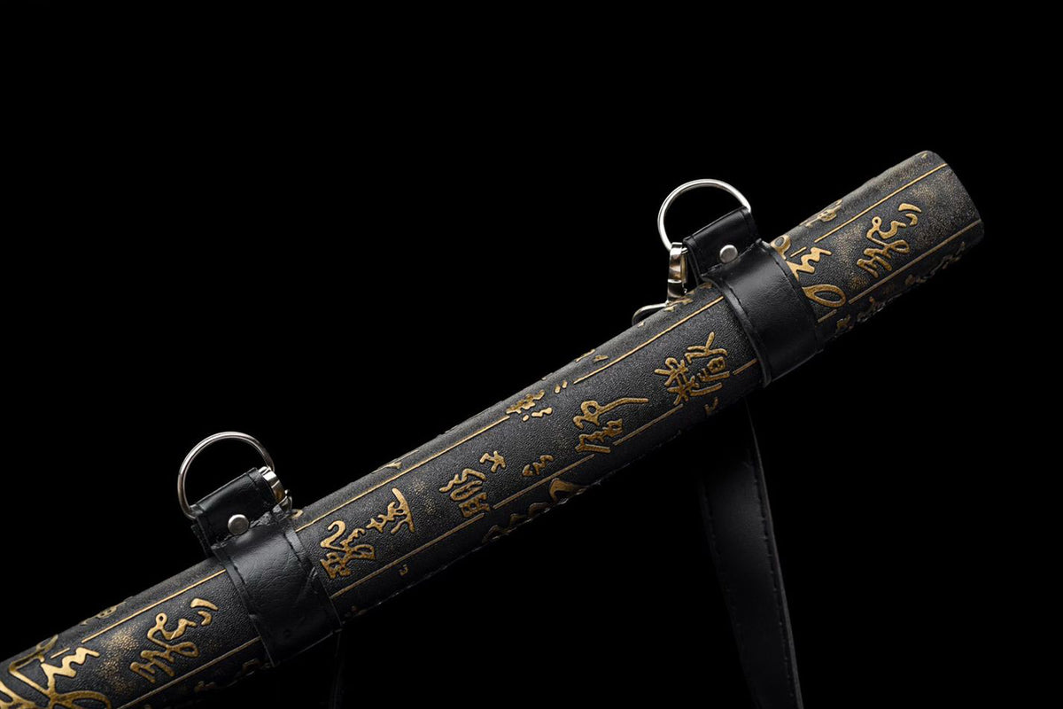 Black carrying strap attached to the gold-lettered lacquered saya