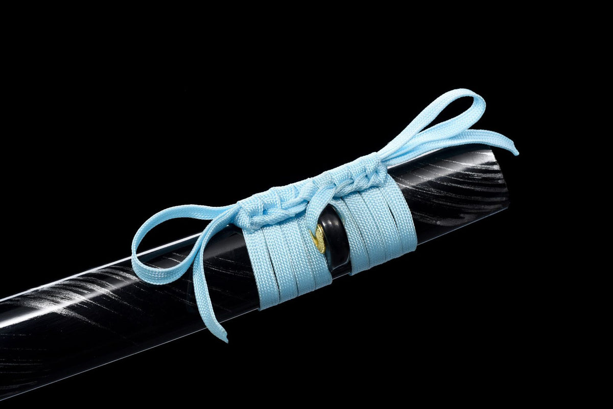 Black scabbard mouth with light blue cord and silver-grey diagonal brushstrokes