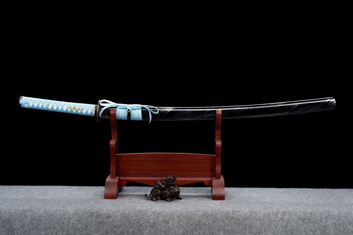 Full sheathed view of Cloud Current with light blue handle wrap and black scabbard