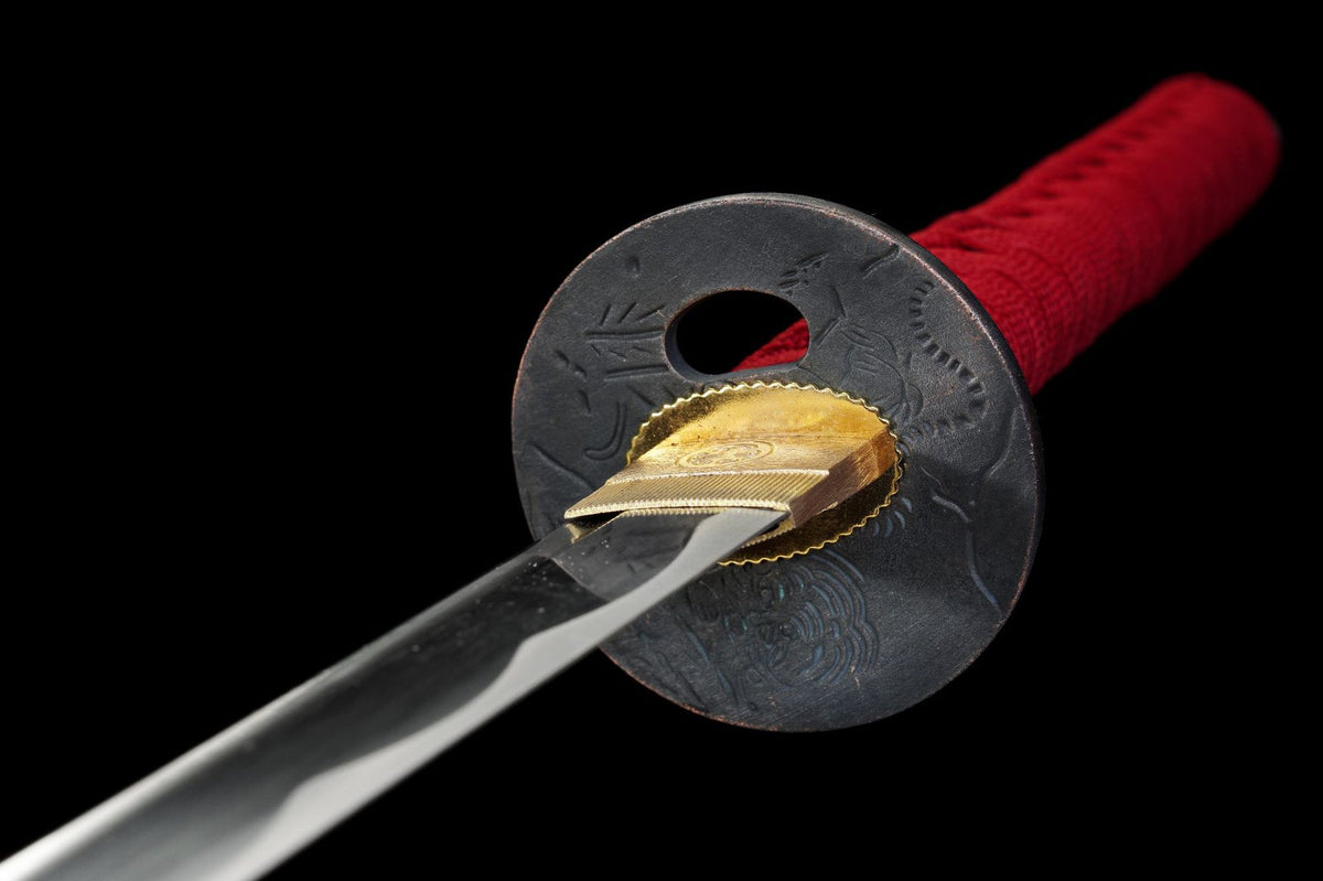 Classical-style round tsuba on the Crimson Katana