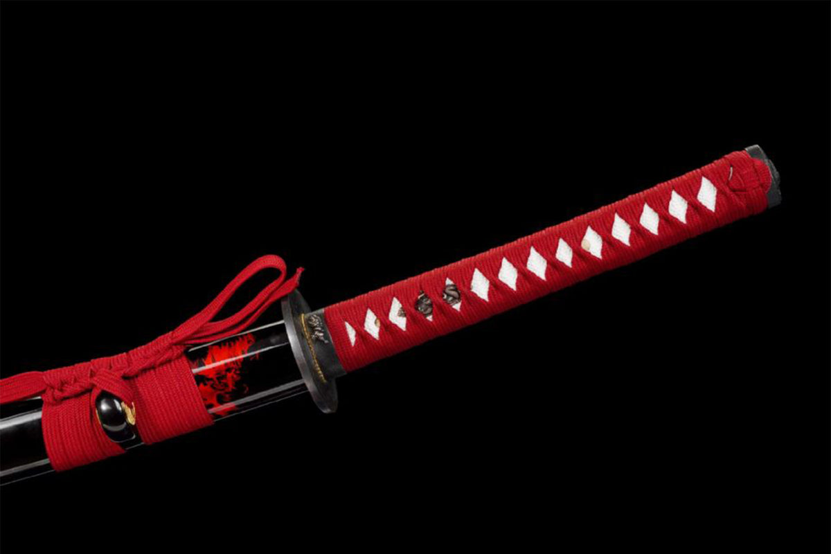 Crimson Katana handle beside the black-and-red saya