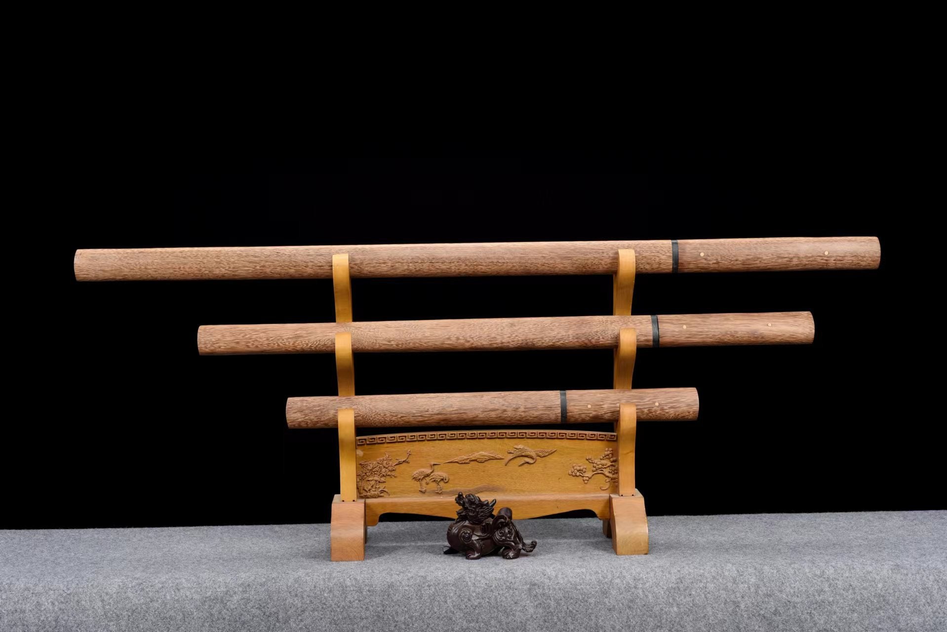 Ebony Straight Katana Set with Katana, Wakizashi, and Tanto displayed in saya