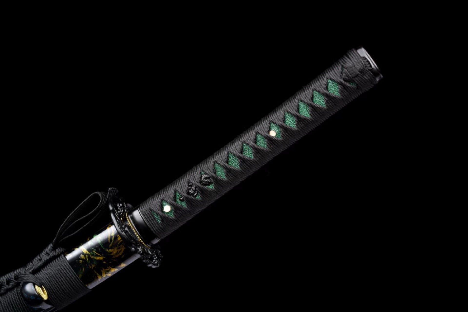 Black handle wrap with green diamond-pattern accents