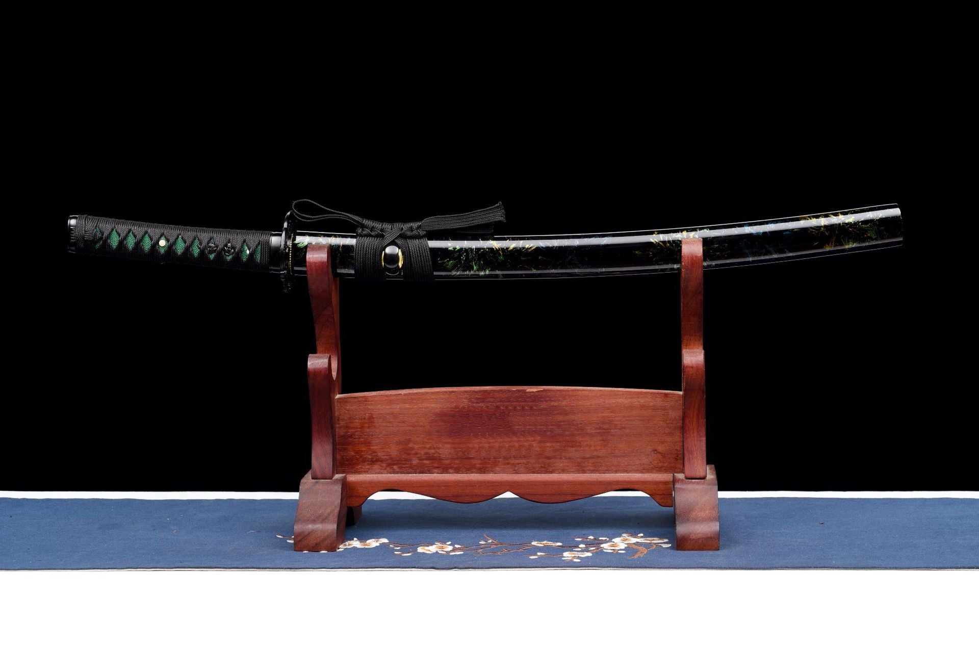 Black lacquered saya and green-accented handle on the Emerald Shadow Wakizashi