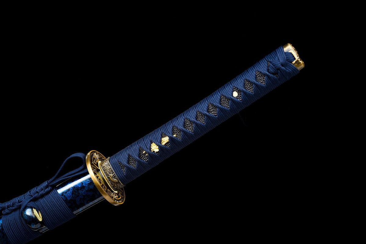 Blue tsuka-ito with black diamond-shaped openings and gold-toned details