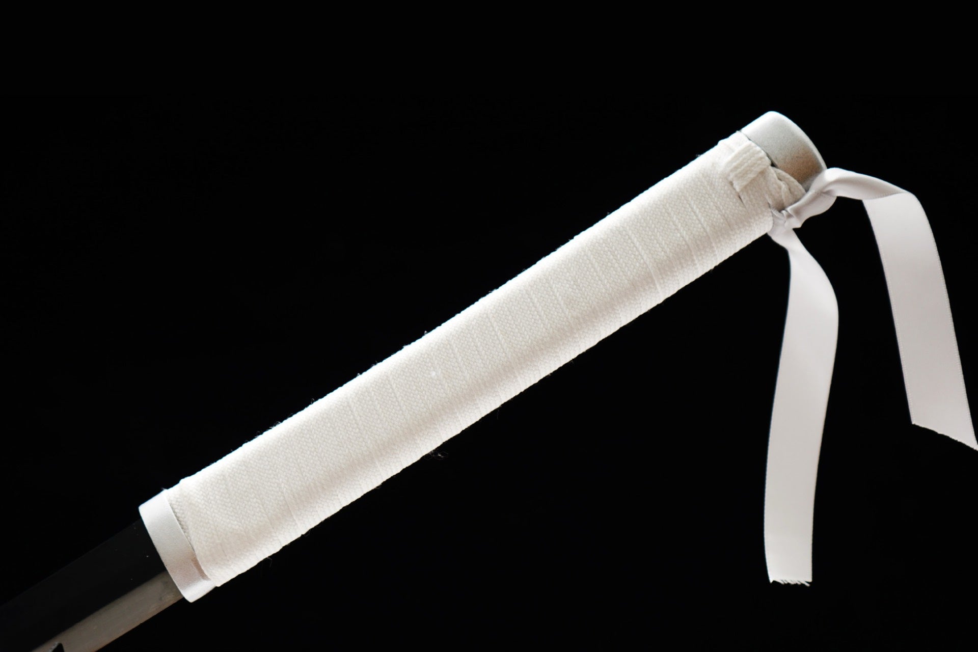 White cord-wrapped handle with white tie detail