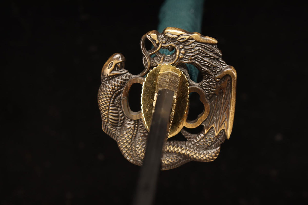 Antique-bronze-tone openwork dragon tsuba on the Jade Dragon Katana