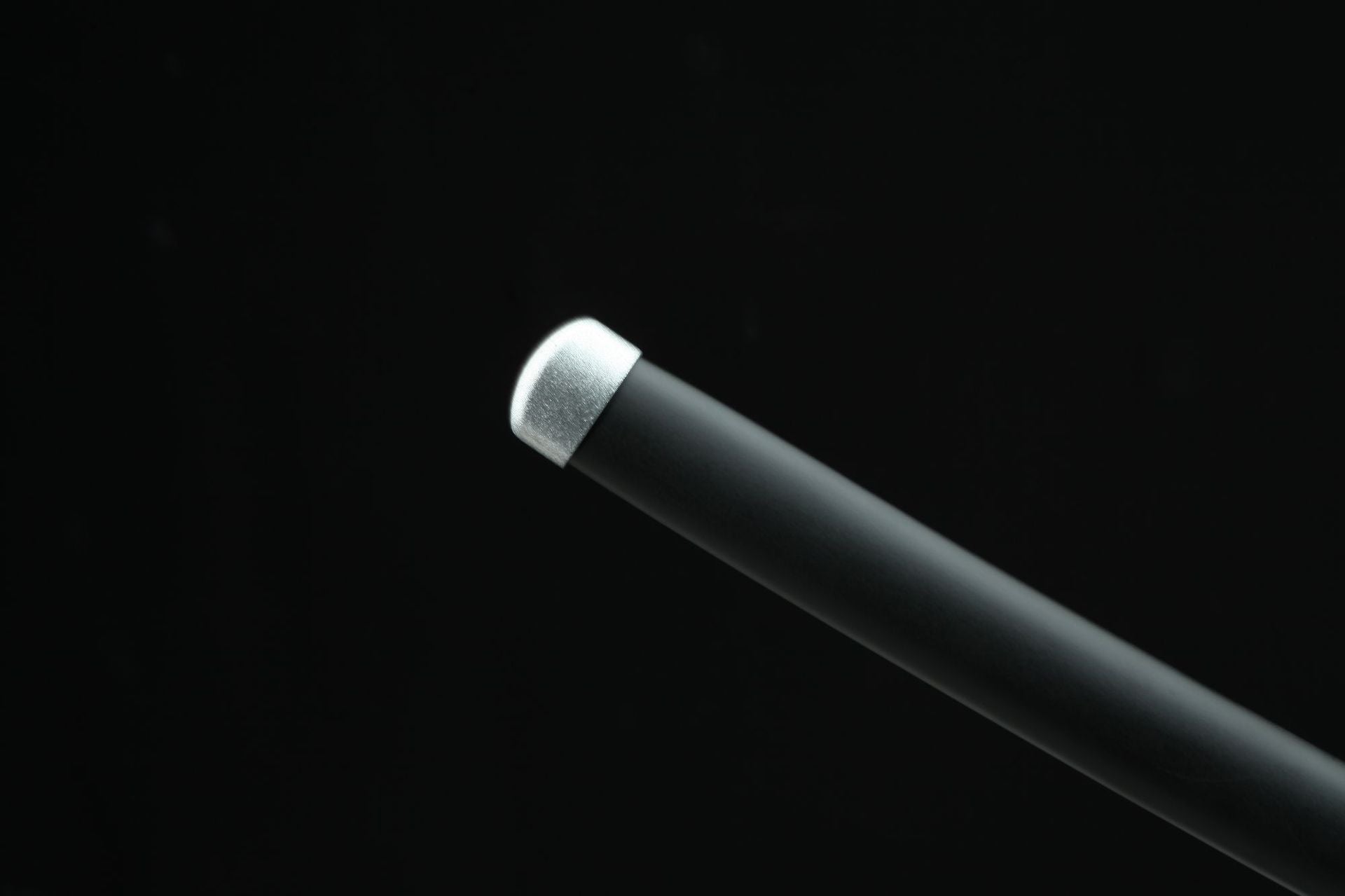 Black scabbard with silver-toned end cap