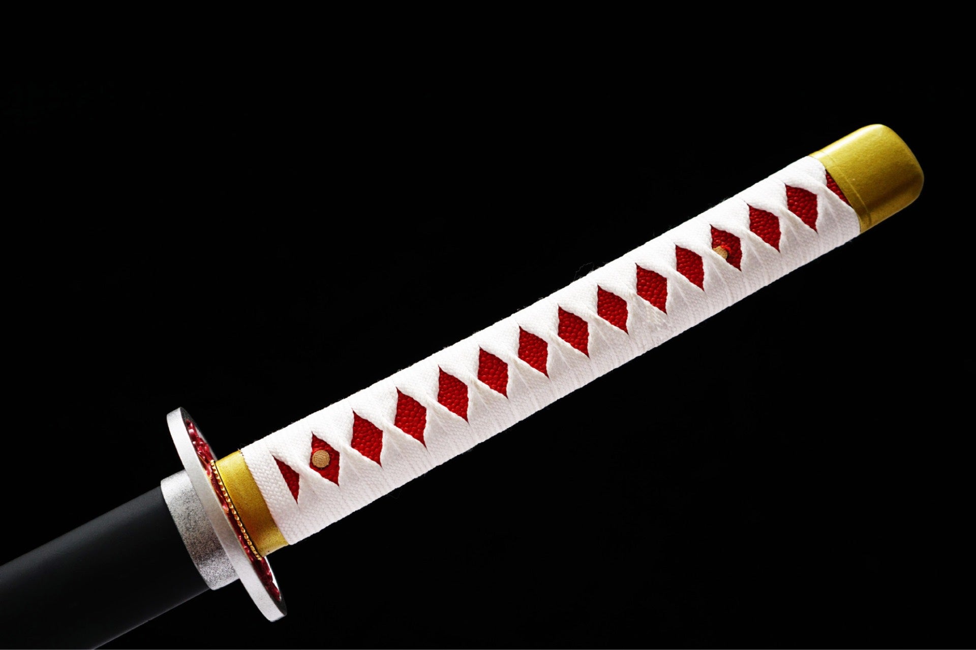 White cord-wrapped handle with red underlayer and gold-toned pommel