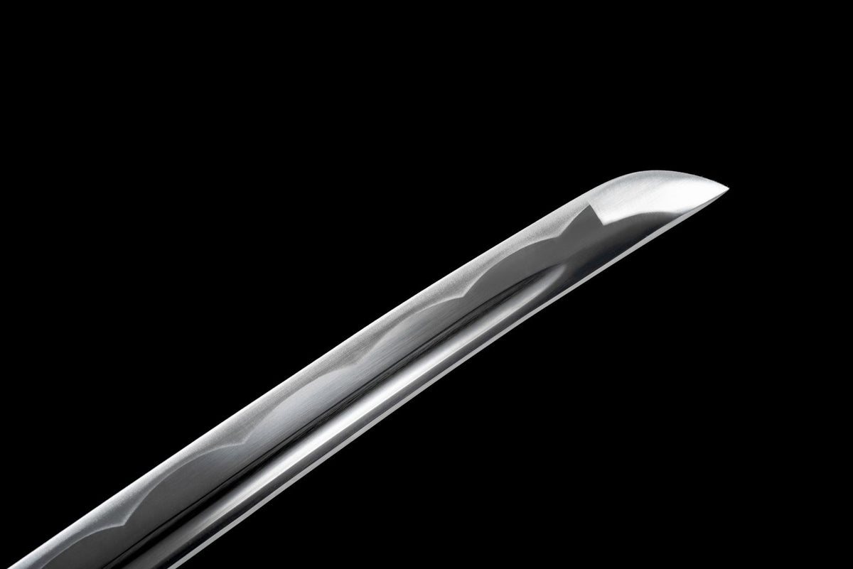 Sharpened kissaki of the Black Chrysanthemum Katana