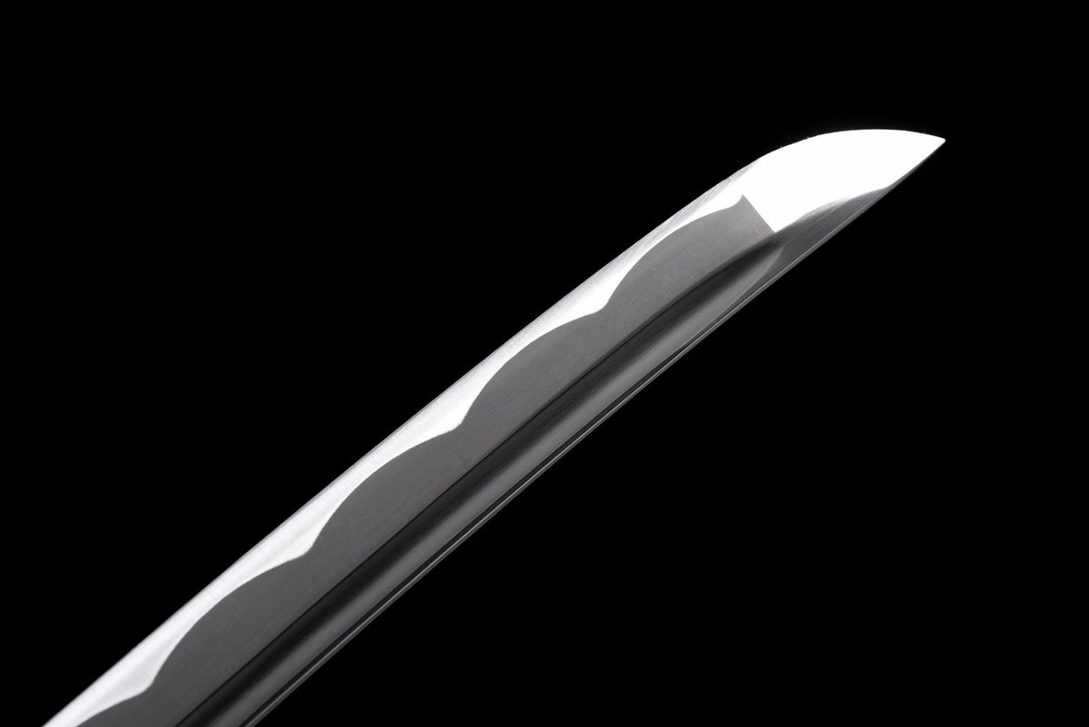 Polished curved blade tip on Leopard Katana