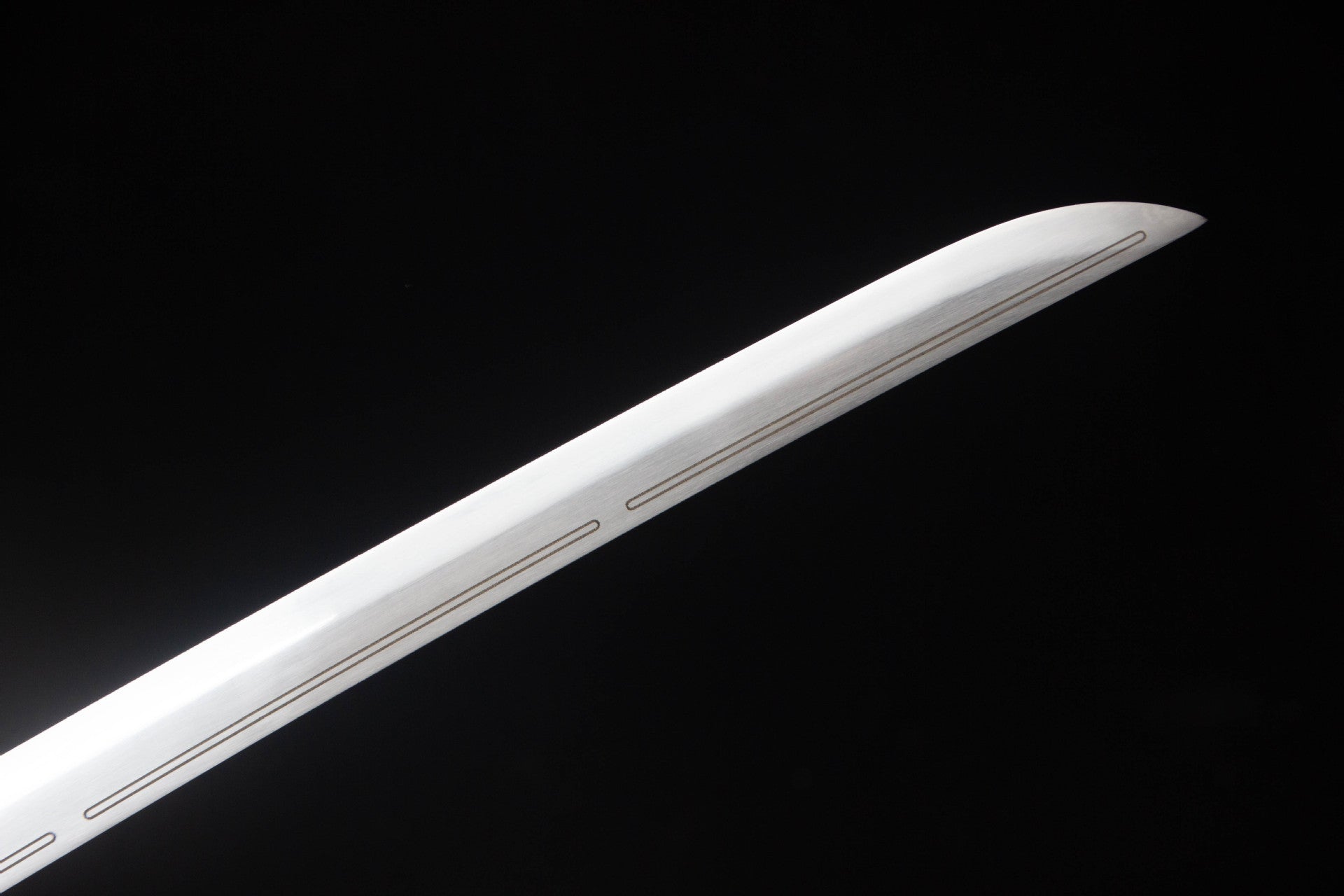Grooved manganese steel blade and kissaki on Mirror Dragon Katana