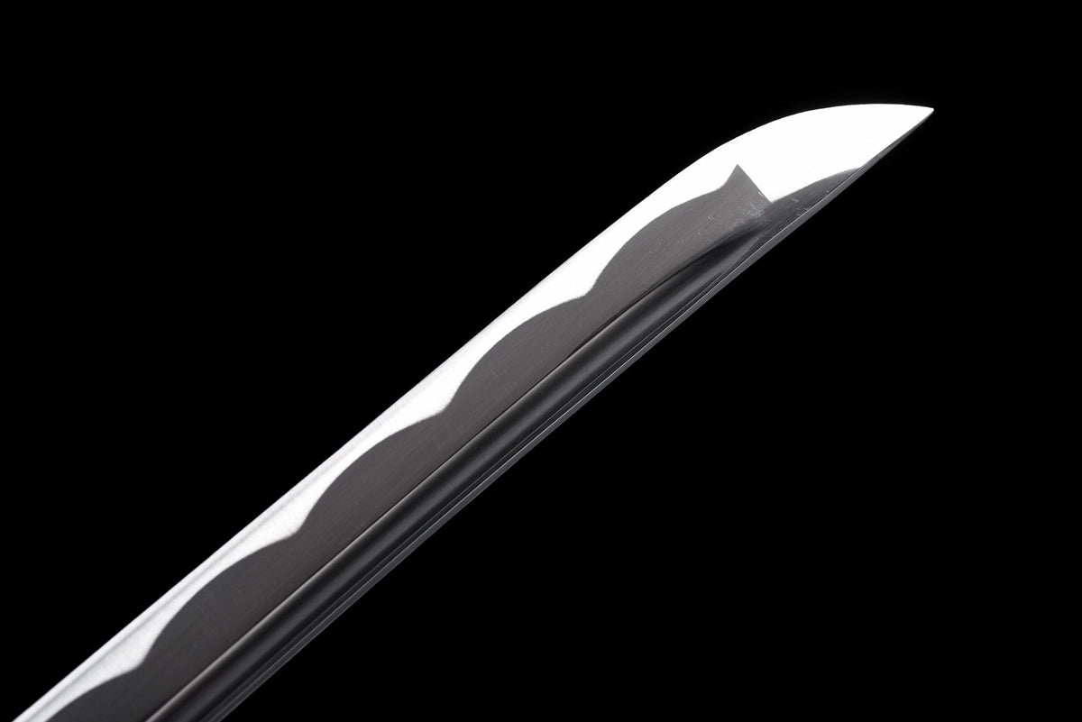 Kissaki with bo-hi and decorative hamon-style wave pattern