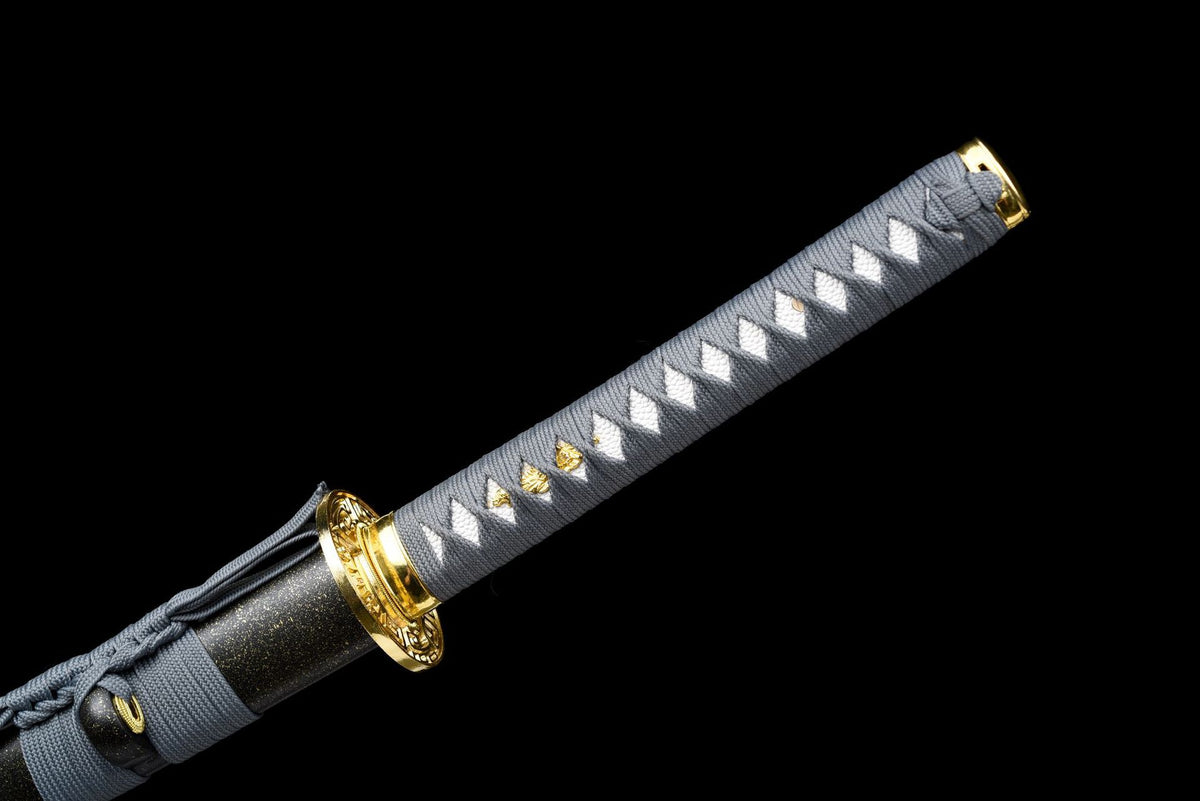 Gray cord wrap over white textured tsuka panels