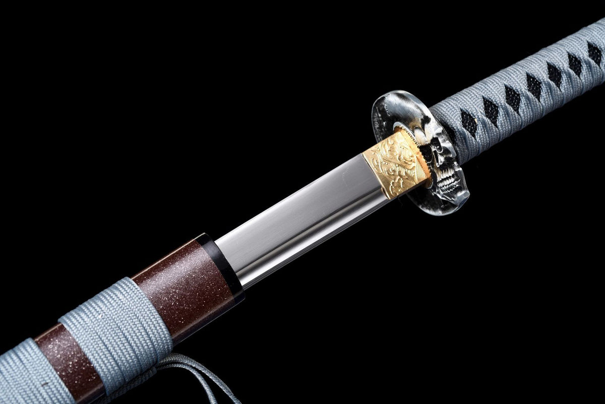 Patterned habaki and warrior relief tsuba on the Silent Warrior Katana