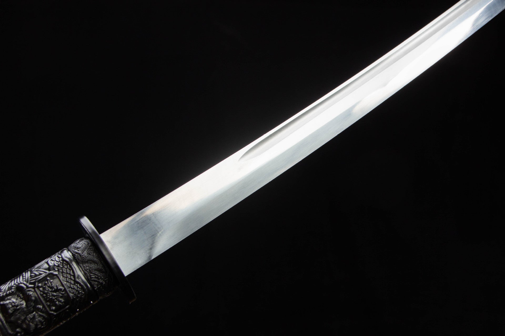 Reflective manganese steel blade surface on the Silver Dragon Katana