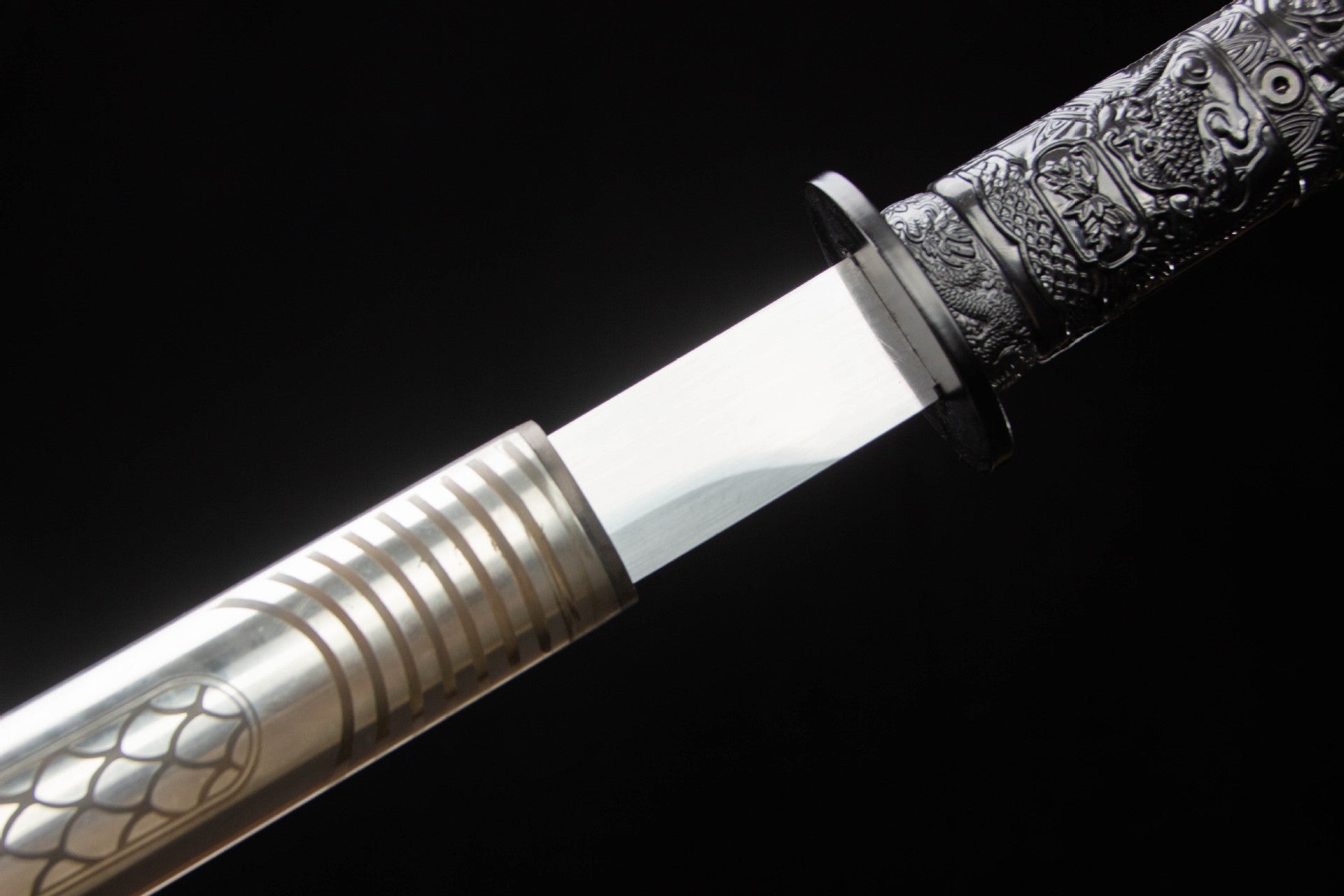 Black guard and stainless steel saya mouth on the Silver Dragon Katana